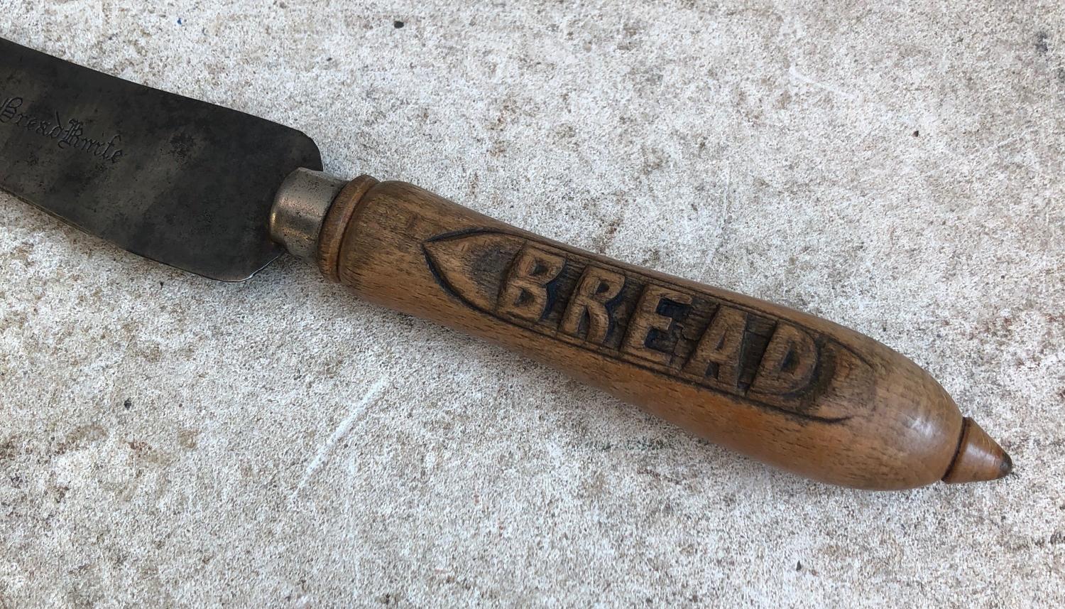 Early 20th Century Carved Bread Knife with Stamped Steel Blade