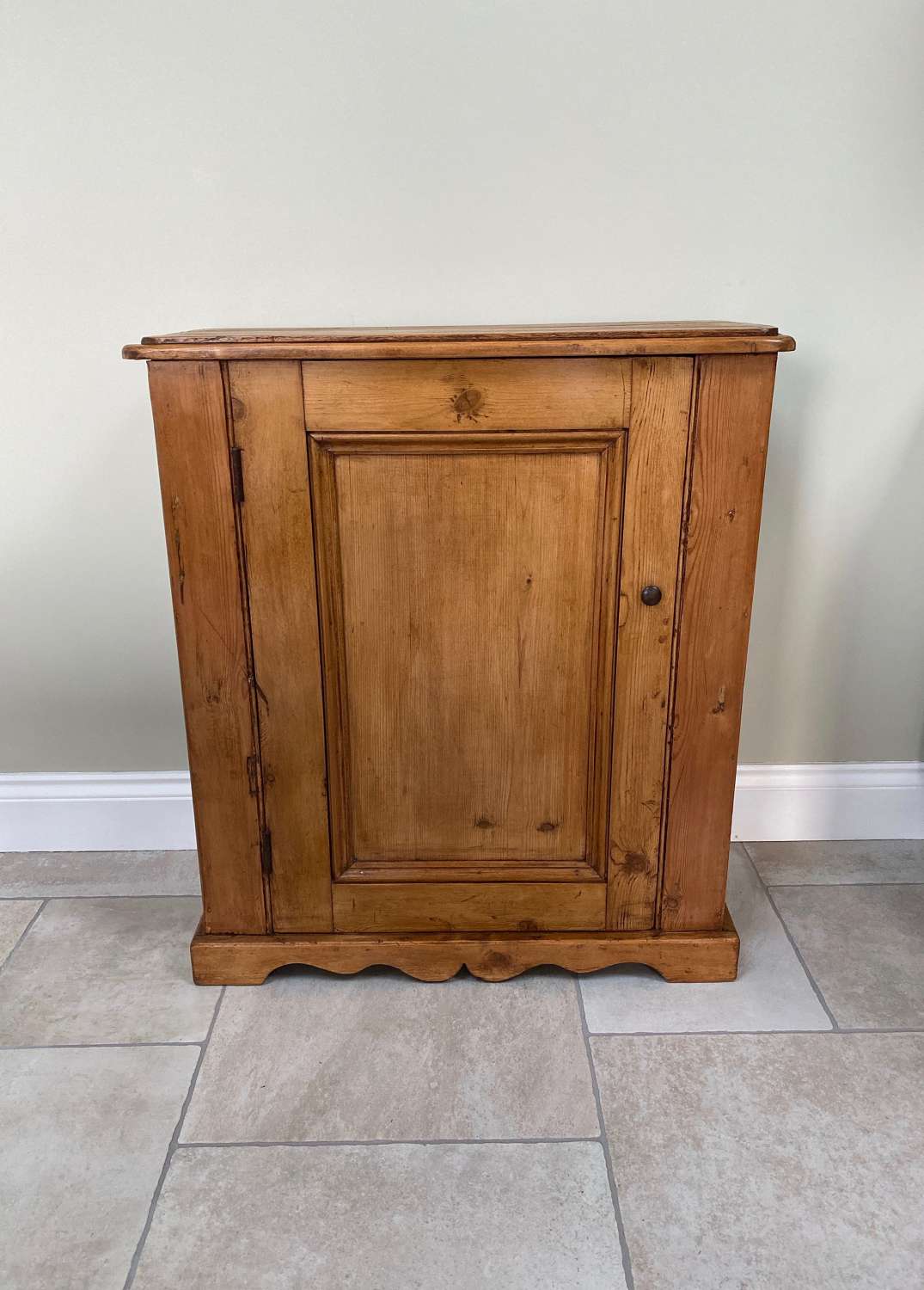 Early 20th Century Pine Cupboard with Shaped Plinth Front