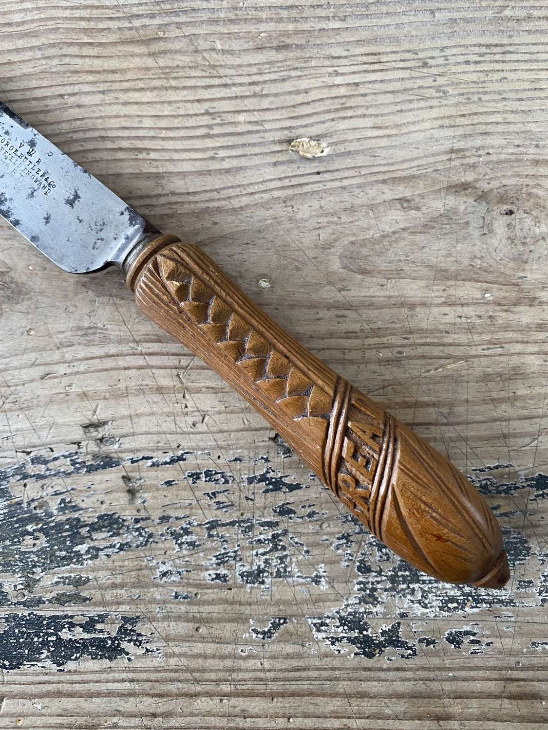 Victorian Bread Knife with Stamped Steel Blade Unusually Carved Handle