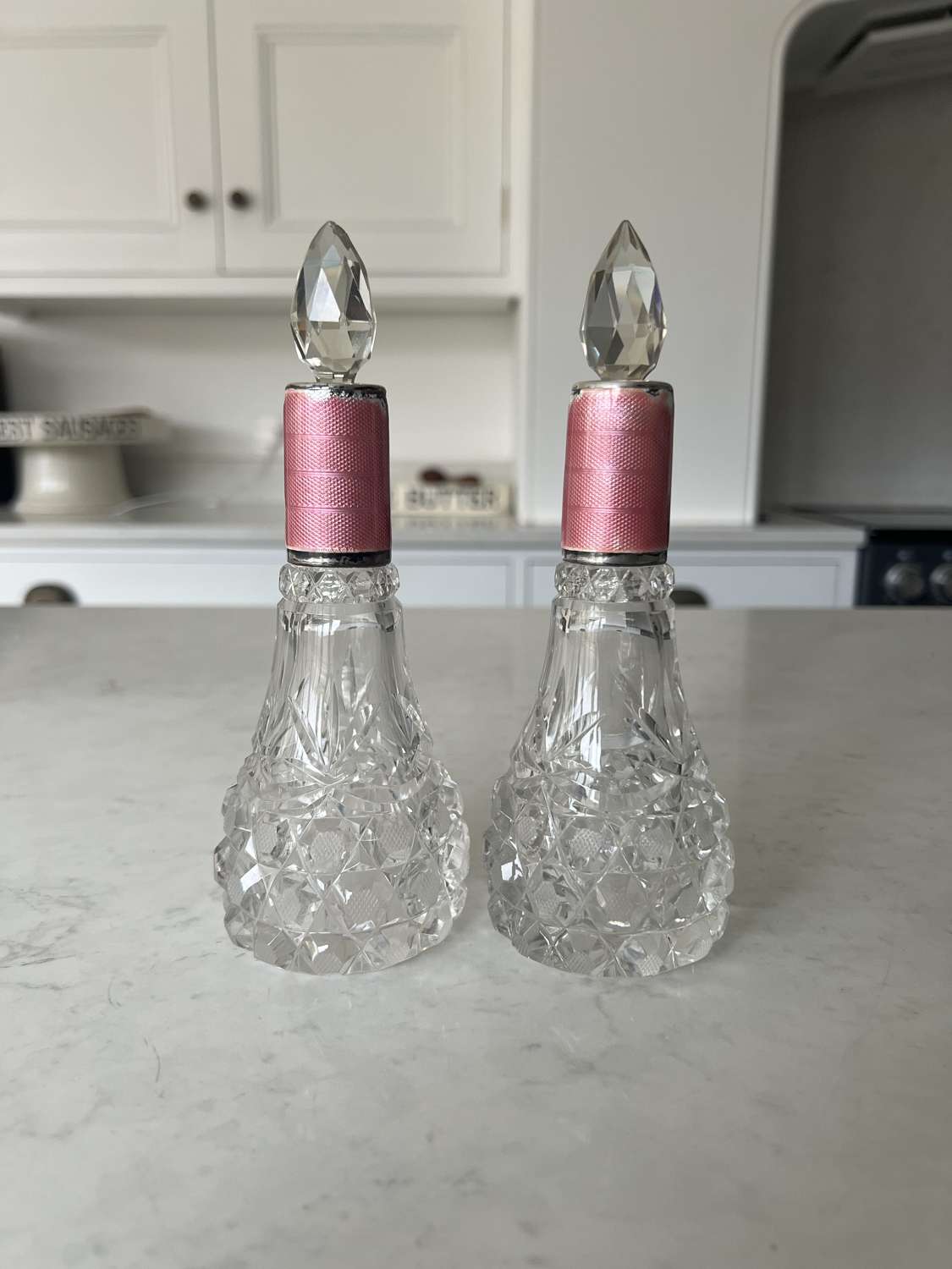 Pair of Edwardian Glass Perfume Bottles. Pink Enamel & Silver Tops.