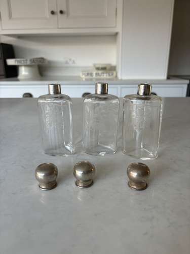 Three Early 20thC Etched Glass Scent Bottles with Real Silver Tops