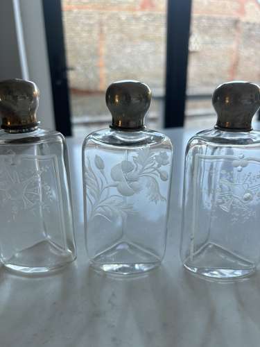 Three Early 20thC Etched Glass Scent Bottles with Real Silver Tops