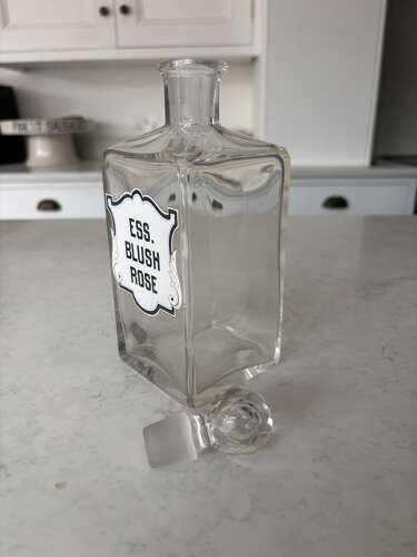 Pair of Edwardian Glass Perfumery Bottles with Painted Enamel Labels. Excellent Condition.