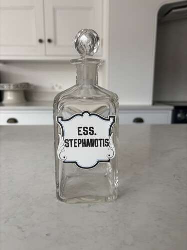 Pair of Edwardian Glass Perfumery Bottles with Painted Enamel Labels. Excellent Condition.