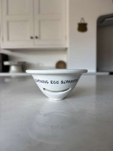 Early 20thC white ironstone Lightning Egg Separator