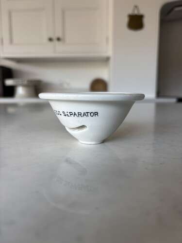 Early 20thC white ironstone Lightning Egg Separator